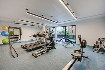 Fitness center with cardio and weight training equipment